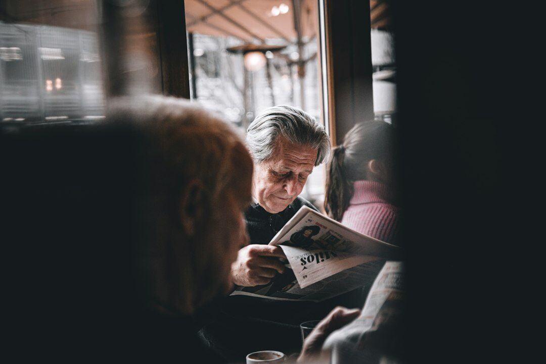 person reading newspaper